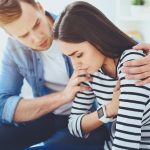 Beautiful young woman having heartache